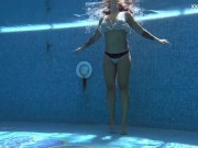 Chubby babe Puzan Bruhova swims naked in the pool 2/16