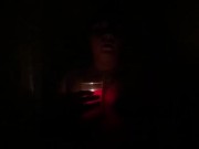 Hot babe showering with candle