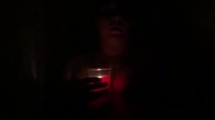 Hot babe showering with candle 