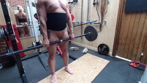 Naked deadlifts with diamond pierced clit