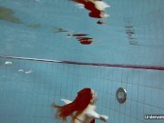 Nudist babes in the pool underwater stripping 1/16