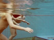 Nudist babes in the pool underwater stripping 16/16