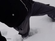 Russian guy walks in the snow near the river, pissing in the snow, he was noticed by a strange guy