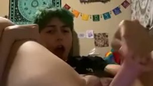 Short haired slut fucks herself