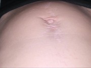 Relaxed belly button close up and breathing