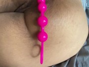 Up close Ebony sucking butt plug with asshole