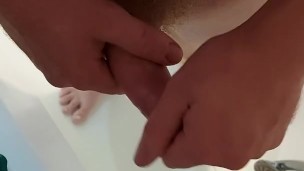 Standing in the bath cumshot