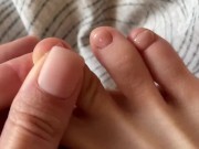 Toes with beige pedicure 14/16