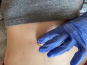 Belly button and medical gloves 10/16