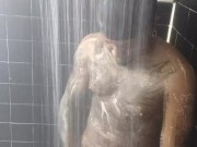 Tattooed  stud jerks dick in the shower 