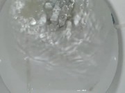 Peeing standing up in a dirty toilet