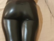 Sexy babe teasing in shiny leather touching herself 12/16