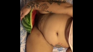 Fucking with dildo and watermelon