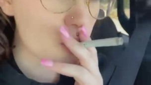 Smoking a cigarette in the car
