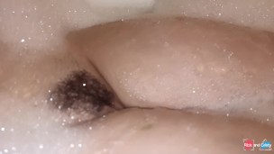 Horny MILF taking a bath