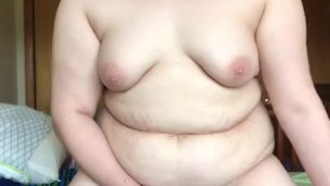 Curvy MILF fucks herself with new wand on knees