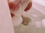 blonde model soaks her feet then deepthroats toy