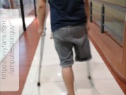 Amputee guy walking with crutches