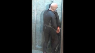 part 2 of wetsuited siliconed masked guy humping, cumming and pissing on dummy