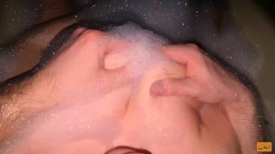 Horny fit girl cums in the bath after a workout - UnlimitedOrgasm touching boobs