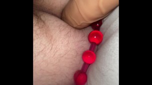 Bed time anal bead session under the covers