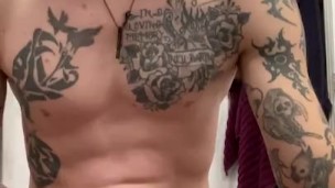 Tattooed guy jerking with dirty talk and cums early in the morning