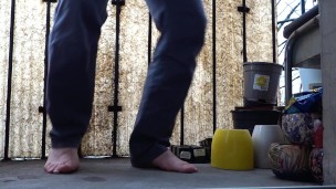 Desperate pee in jeans on the balcony