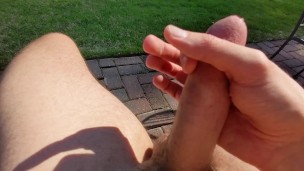 Jacking off outside in back yard while neighbors are out talking