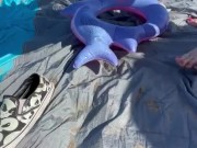 BBW milf crushes floatie in public at the beach