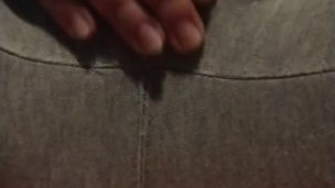 Gray sweatpants wetting peed pants