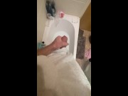 Horny big cock guy wanking in the bath, cumming in bathwater over feet, masturbating uncut big dick