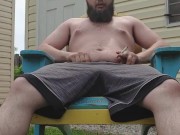 Pissing all over my self with my fat uncut cock in the sun - Screenshot 1 of 16 - HD