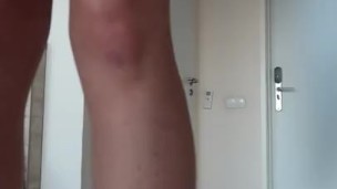 toned student dressed in high heels and shows her legs