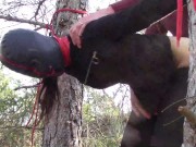 Tied up to a tree outdoor on sexy clothes, wearing pantyhose and high ankle boots heels, rough fuck