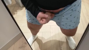 A very risky wank in the changing room!