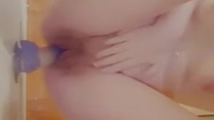 Horny blonde sneaks to bathroom to play with big dildo (part 2)