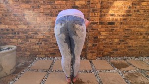 Getting my clothes soaked in piss by a petite slut | self jean piss | posing and undressing