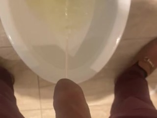 LAS VEGAS – STRAIGHT UNCUT LATINO TAKING A PISS