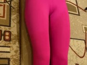 Lesbi in pink leggings makes exercises for abs