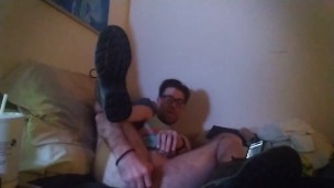Plugging my hole up; gay bottom on his back playing with butt plug