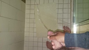 Penis Envy. Shooting his piss all over in the hotel shower! Holding his dick while he pees.