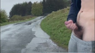  TEEN JERKING OFF OUTSIDE IN THE RAIN
