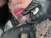 Gorgeous chick covered in tattoos gets another tattoo on her face 13/16