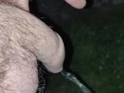 Pissing in the dark outside, uncut cock