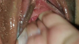 Tight pussy squeezes fingers