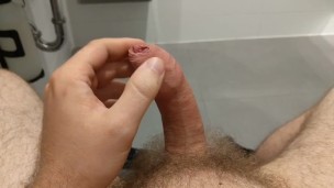 Stroking my dick in the mall public bathroom