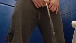 Posing and pissing in the gym loo