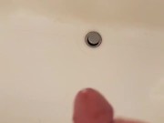 Shooting big load into bathtub