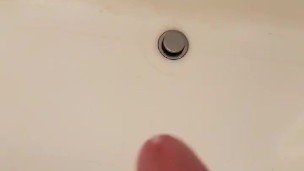 Shooting big load into bathtub