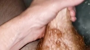 Ginger bear playing with dick in the hot tub
